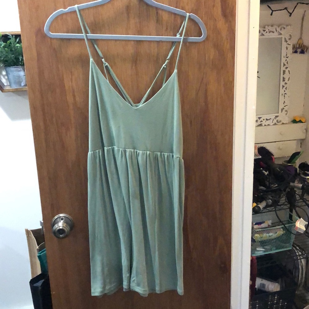 Green dress. Strapped back